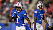 Nov 30, 2024; Dallas, Texas, USA; Southern Methodist Mustangs running back Brashard Smith (1) in action during the game between the SMU Mustangs and the California Golden Bears at Gerald J. Ford Stadium. Mandatory Credit: Jerome Miron-Imagn Images