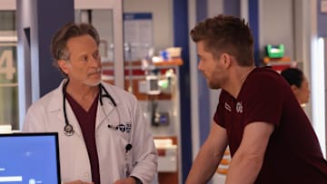 CHICAGO MED -- "The Stories We Tell Ourselves" Episode 1019 -- Pictured: (l-r) Oliver Platt as Dr. Daniel Charles, Steven Weber as Dr. Dean Archer, Luke Mitchell as Dr. Mitch Ripley -- (Photo by: George Burns Jr/NBC)