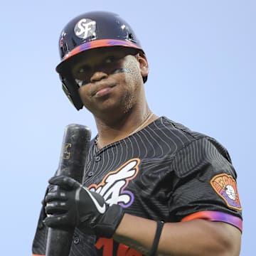 Jul 8, 2025; San Francisco, California, USA; San Francisco Giants designated hitter Rafael Devers (16) reacts after striking out to end the fifth inning leaving a runner on third base against the Philadelphia Phillies at Oracle Park. Mandatory Credit: Kelley L Cox-Imagn Images