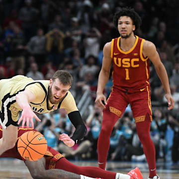 Mar 13, 2025; Indianapolis, IN, USA; Purdue Boilermakers guard Braden Smith (3) is fouled by USC Trojans forward Rashaun Agee (12) during the second half at Gainbridge Fieldhouse. Mandatory Credit: Robert Goddin-Imagn Images