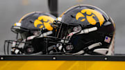 Oct 14, 2023; Madison, Wisconsin, USA;  General view of Iowa Hawkeyes helmets prior to the game against the Wisconsin Badgers at Camp Randall Stadium. Mandatory Credit: Jeff Hanisch-Imagn Images