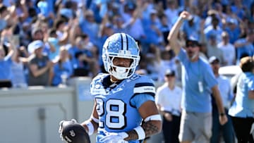 Oct 12, 2024; Chapel Hill, North Carolina, USA; North Carolina Tar Heels running back Omarion Hampton (28) runs for a touchdown in the third quarter at Kenan Memorial Stadium. Mandatory Credit: Bob Donnan-Imagn Images