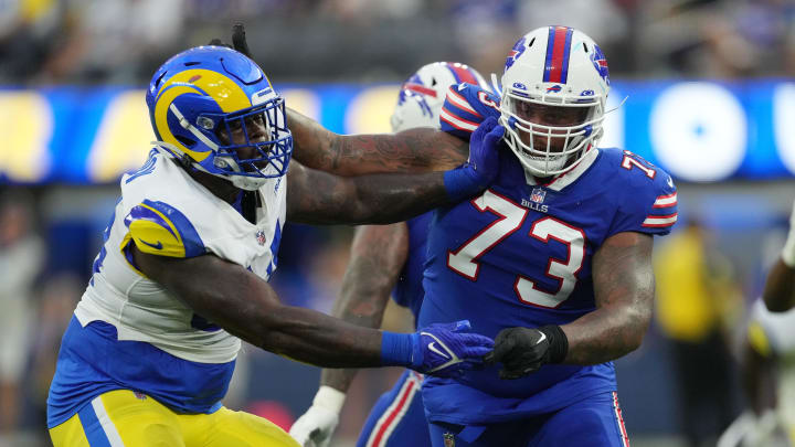 Sep 8, 2022; Inglewood, California, USA; Los Angeles Rams linebacker Leonard Floyd (54) defends against  Buffalo Bills offensive tackle Dion Dawkins (73) in the second quarter at SoFi Stadium. Mandatory Credit: Kirby Lee-USA TODAY Sports