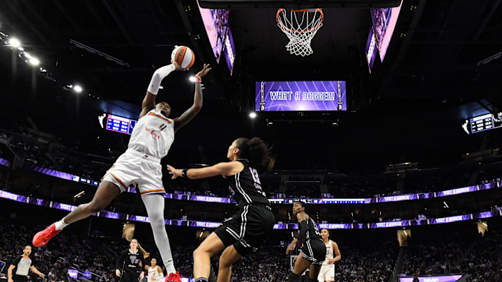 Aug 19, 2025; San Francisco, California, USA; Phoenix Mercury center Natasha Mack (4) shoots against Golden State Valkyries forward Janelle Salaun (13) in the fourth quarter at Chase Center. Mandatory Credit: Eakin Howard-Imagn Images