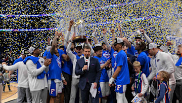 Mar 16, 2025; Nashville, TN, USA;  Florida Gators celebrate the win against the Tennessee Volunteers at the 2025 SEC Championship Game at Bridgestone Arena. Mandatory Credit: Steve Roberts-Imagn Images