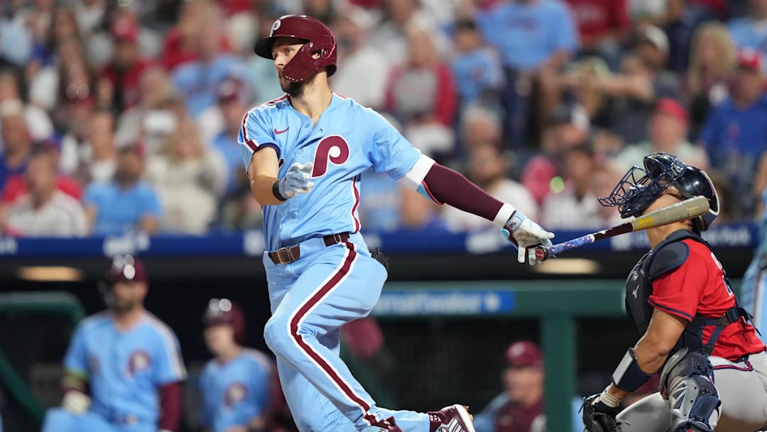 Aug 28, 2025; Philadelphia, Pennsylvania, USA; Philadelphia Phillies infielder Trea Turner (7) hits an RBI double against the Atlanta Braves in the fourth inning at Citizens Bank Park. Mandatory Credit: Kyle Ross-Imagn Images