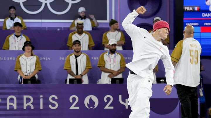 Aug 10, 2024; Paris, FRANCE; PHIL WIZARD (Canada) celebrates winning the gold medal in breaking during the Paris 2024 Olympic Summer Games at La Concorde.