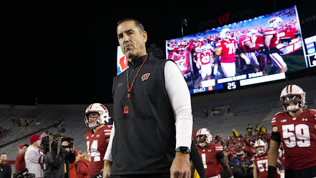 Wisconsin Badgers head coach Luke Fickell walks onto the field prior to the game against the Oregon Ducks
