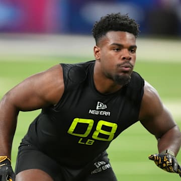 Feb 27, 2025; Indianapolis, IN, USA; Iowa linebacker Jay Higgins (LB08) participates in drills during the 2025 NFL Combine at Lucas Oil Stadium. Mandatory Credit: Kirby Lee-Imagn Images