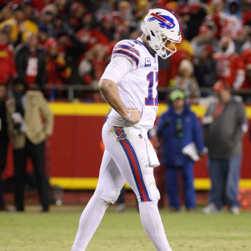 Bills quarterback Josh Allen walks off the field after a Chiefs stop. The Chiefs beat the Bills 42-36 in overtime.