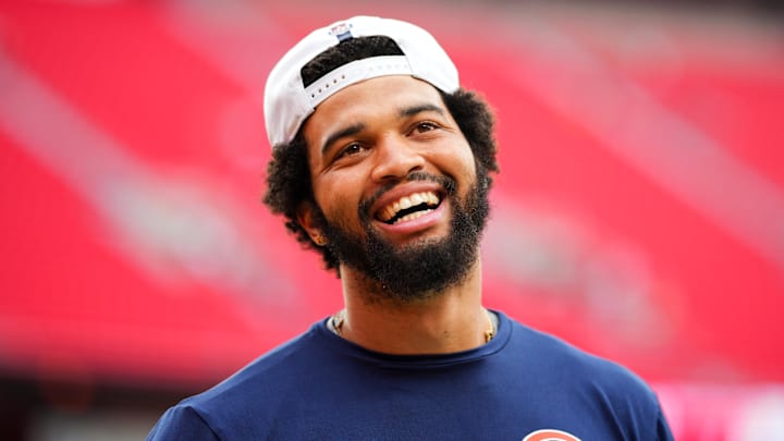 Chicago Bears quarterback Caleb Williams warms up before a preseason game.