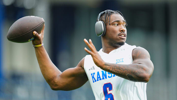 Sep 13, 2024; Kansas City, Kansas, USA; Kansas Jayhawks quarterback Jalon Daniels (6) warms up prior to a game against the UNLV Rebels at Children's Mercy Park.