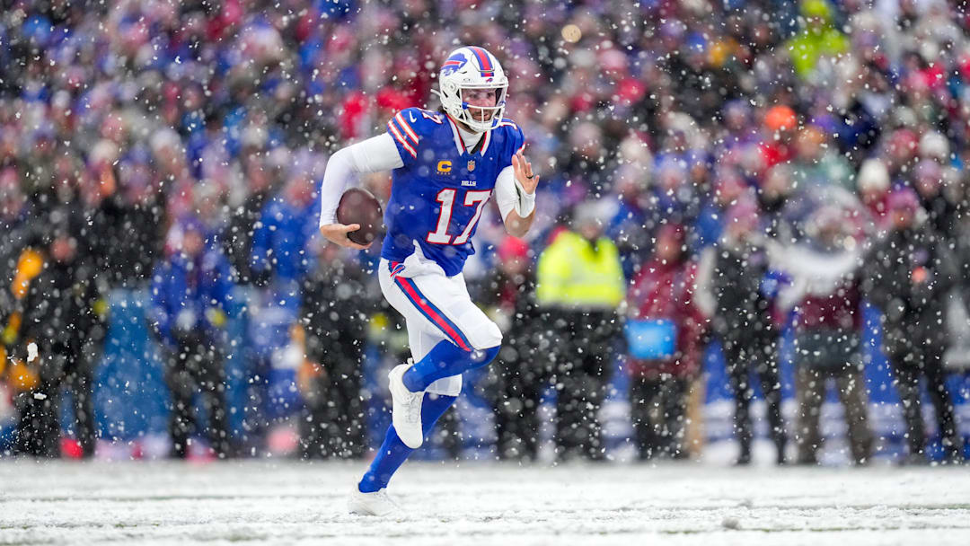Buffalo Bills’ quarterback Josh Allen (17) breaks away for a touchdown run in the fourth quarter of the NFL Week 14 game between the Buffalo Bills and the Cincinnati Bengals at Highmark Stadium in Orchard Park, N.Y., 