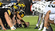 Sep 30, 2023; Iowa City, Iowa, USA; The line of scrimmage between the Iowa Hawkeyes and the Michigan State Spartans during the second quarter at Kinnick Stadium. Mandatory Credit: Jeffrey Becker-Imagn Images