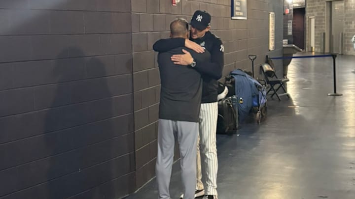 Los Angeles Dodgers manager Dave Roberts and New York Yankees manager Aaron Boone embrace after Game 5 of the 2024 World Series at Yankee Stadium on October 30, 2024. Los Angeles Dodgers manager Dave Roberts and New York Yankees manager Aaron Boone embrace after Game 5 of the 2024 World Series at Yankee Stadium on October 30, 2024.