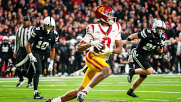 Nov 1, 2025; Lincoln, Nebraska, USA; Southern California Trojans wide receiver Ja'Kobi Lane (8) runs against Nebraska Cornhuskers defensive back Andrew Marshall (10) and defensive back Rex Guthrie (21) during the second quarter at Memorial Stadium. Mandatory Credit: Dylan Widger-Imagn Images
