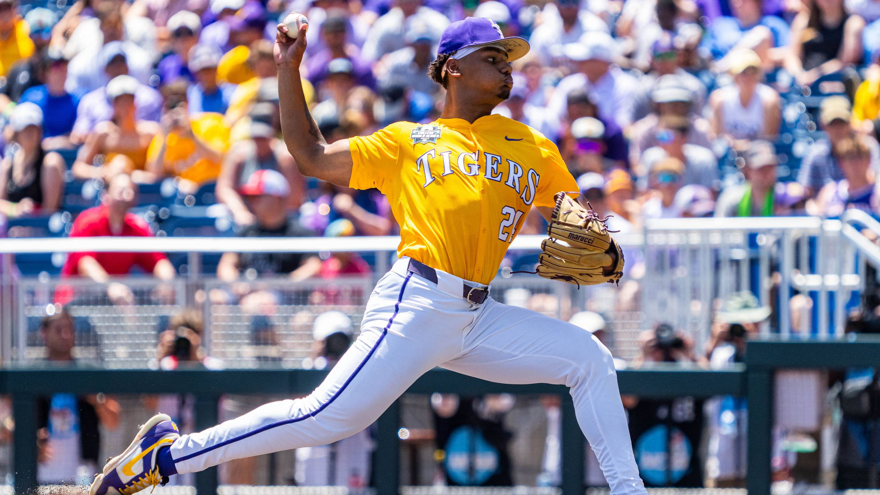 Jun 22, 2025; Omaha, Neb, USA; LSU Tigers starting pitcher Anthony Eyanson (24) pitches against the Coastal Carolina Chanticleers during the first inning at Charles Schwab Field. Mandatory Credit: Dylan Widger-Imagn Images