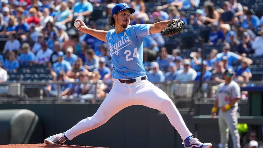 Sep 7, 2025; Kansas City, Missouri, USA; Kansas City Royals starting pitcher Michael Lorenzen (24) delivers a pitch against the Minnesota Twins during the first inning at Kauffman Stadium. Sep 7, 2025; Kansas City, Missouri, USA; Kansas City Royals starting pitcher Michael Lorenzen (24) delivers a pitch against the Minnesota Twins during the first inning at Kauffman Stadium.