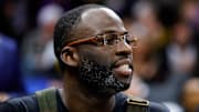 Jan 22, 2025; Sacramento, California, USA; Golden State Warriors forward Draymond Green (23) sits on the bench during the second quarter against the Sacramento Kings at Golden 1 Center. Mandatory Credit: Sergio Estrada-Imagn Images
