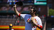 Sep 21, 2025; St. Louis, Missouri, USA; St. Louis Cardinals third baseman Nolan Arenado (28) salutes the fans after he was ceremonially removed before the start of the first inning against the Milwaukee Brewers at Busch Stadium. Mandatory Credit: Jeff Curry-Imagn Images
