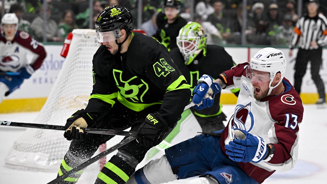 Nov 29, 2024; Dallas, Texas, USA; Dallas Stars defenseman Ilya Lyubushkin (46) checks Colorado Avalanche right wing Valeri Nichushkin (13) during the third period at the American Airlines Center. Mandatory Credit: Jerome Miron-Imagn Images