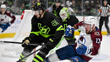 Nov 29, 2024; Dallas, Texas, USA; Dallas Stars defenseman Ilya Lyubushkin (46) checks Colorado Avalanche right wing Valeri Nichushkin (13) during the third period at the American Airlines Center. Mandatory Credit: Jerome Miron-Imagn Images