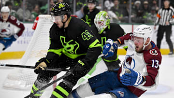 Nov 29, 2024; Dallas, Texas, USA; Dallas Stars defenseman Ilya Lyubushkin (46) checks Colorado Avalanche right wing Valeri Nichushkin (13) during the third period at the American Airlines Center. Mandatory Credit: Jerome Miron-Imagn Images