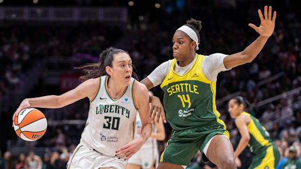  Liberty forward Breanna Stewart (30) dribbles the ball against Seattle Storm center Dominique Malonga. 