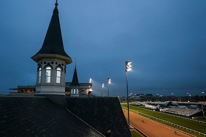 Dawn as horses took to the track for an early workout before the 151s Run For The Roses on Kentucky Derby day.