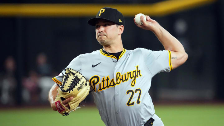 Jul 27, 2024; Phoenix, Arizona, USA; Pittsburgh Pirates pitcher Marco Gonzales (27) pitches against the Arizona Diamondbacks during the first inning at Chase Field. Mandatory Credit: Joe Camporeale-USA TODAY Sports