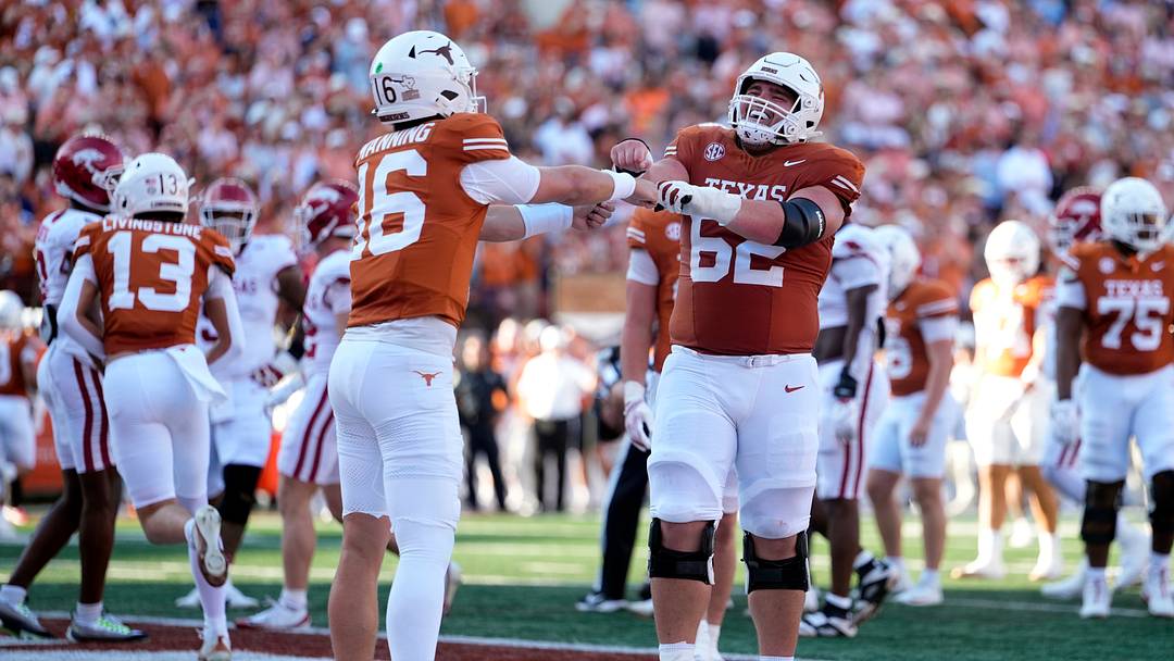 Texas Longhorns celebrate during the first half against the Arkansas Razorbacks at Darrell K Royal-Texas Memorial Stadium. Texas Longhorns celebrate during the first half against the Arkansas Razorbacks at Darrell K Royal-Texas Memorial Stadium.