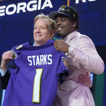NFL commissioner Roger Goodell with Georgia Bulldogs safety Malaki Starks after he is selected by the Baltimore Ravens.