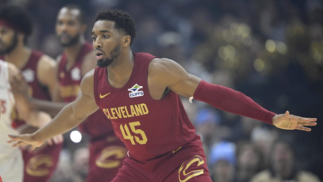Jan 25, 2025; Cleveland, Ohio, USA; Cleveland Cavaliers guard Donovan Mitchell (45) defends in the first quarter against the Houston Rockets at Rocket Mortgage FieldHouse.