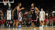Houston Cougars guard Milos Uzan high fives guard Emanuel Sharp after a play against the Duke Blue Devils