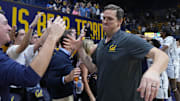 Mark Madsen celebrates with Cal fans