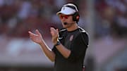 Aug 30, 2025; Los Angeles, California, USA; Southern California Trojans head coach Lincoln Riley watches from the sidelines against the Missouri State Bears in the first half at United Airlines Field at Los Angeles Memorial Coliseum. Mandatory Credit: Kirby Lee-Imagn Images