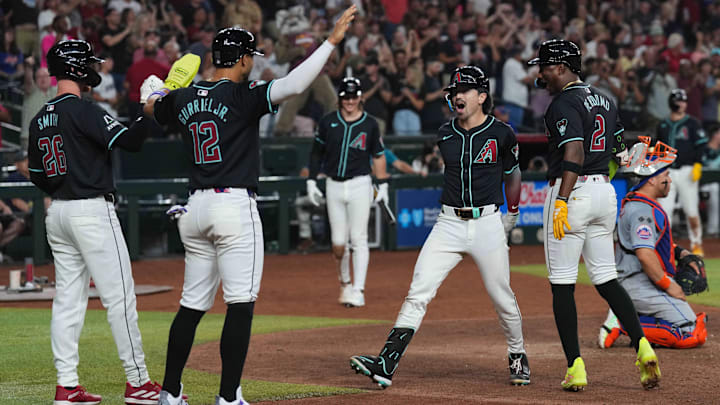 Aug 28, 2024; Phoenix, Arizona, USA; Arizona Diamondbacks outfielder Corbin Carroll (7) celebrates after hitting a grand slam home run against the New York Mets during the eighth inning at Chase Field. Mandatory Credit: Joe Camporeale-Imagn Images