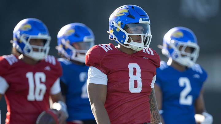 Kansas redshirt sophomore quarterback Isaiah Marshall (8) watches during spring football practice Thursday, Mar. 26, 2026 in Lawrence, Kansas.