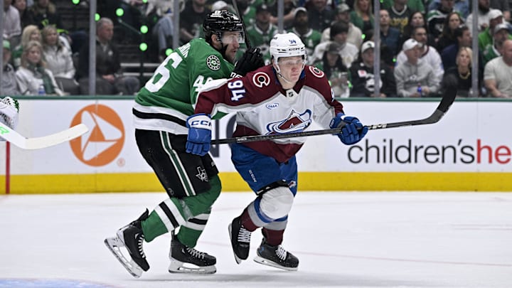 Apr 21, 2025; Dallas, Texas, USA; Dallas Stars defenseman Ilya Lyubushkin (46) and Colorado Avalanche left wing Joel Kiviranta (94) in action during the game between the Dallas Stars and the Colorado Avalanche in game two of the first round of the 2025 Stanley Cup Playoffs at American Airlines Center. Mandatory Credit: Jerome Miron-Imagn Images