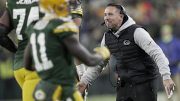 Dec 23, 2024; Green Bay, Wisconsin, USA;  Green Bay Packers head coach Matt LaFleur celebrates a touchdown by running back Chris Brooks during the second quarter of their game against the New Orleans at Lambeau Field. Mandatory Credit: Mark Hoffman/Milwaukee Journal Sentinel/Imagn Images