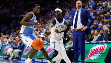 Dec 2, 2025; Lexington, Kentucky, USA; Kentucky Wildcats guard Denzel Aberdeen (1) passes the ball during the second half against the North Carolina Tar Heels at Rupp Arena at Central Bank Center. Mandatory Credit: Jordan Prather-Imagn Images