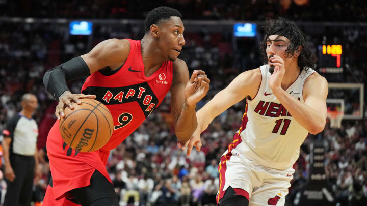 Apr 12, 2024; Miami, Florida, USA;  Toronto Raptors guard RJ Barrett (9) drives toward the basket against Miami Heat forward Jaime Jaquez - Jim Rassol/USA Today Sports