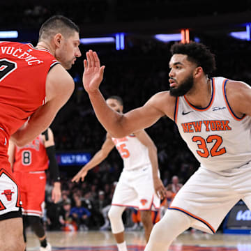 Nov 13, 2024; New York, New York, USA; Chicago Bulls center Nikola Vucevic (9) looks for an opening as New York Knicks center Karl-Anthony Towns (32) defends during the second half at Madison Square Garden. Mandatory Credit: John Jones-Imagn Images