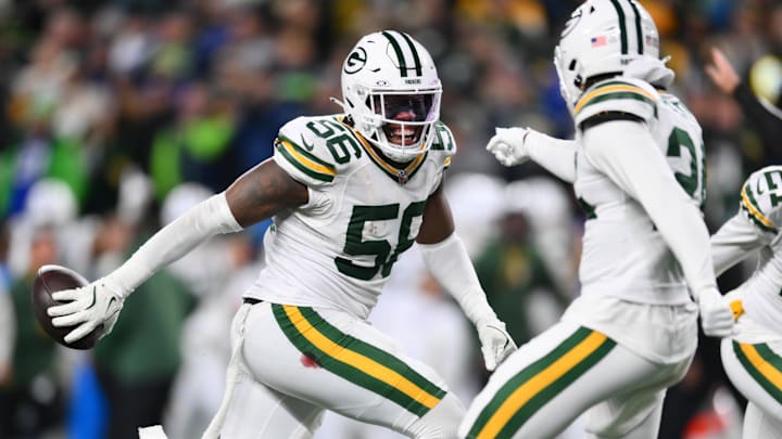 Green Bay Packers linebacker Edgerrin Cooper (56) celebrates after an interception at the Seattle Seahawks.a Green Bay Packers linebacker Edgerrin Cooper (56) celebrates after an interception at the Seattle Seahawks.a