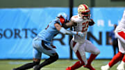 Mar 30, 2024; Arlington, TX, USA; Birmingham Stallions running back Ricky Person (23) stiff arms Arlington Renegades defensive back Myles Dorn (46) during the second half at Choctaw Stadium. Mandatory Credit: Jerome Miron-Imagn Images