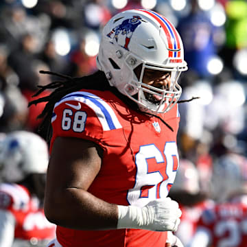 Dec 1, 2024; Foxborough, Massachusetts, USA; New England Patriots center Lecitus Smith (68) warms up before a game against the Indianapolis Colts at Gillette Stadium. Mandatory Credit: Eric Canha-Imagn Images