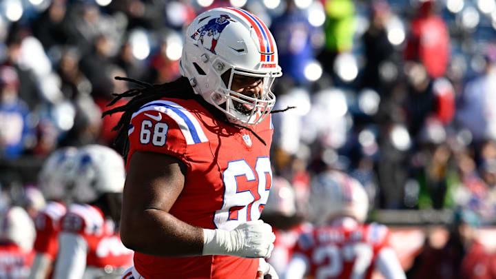 Dec 1, 2024; Foxborough, Massachusetts, USA; New England Patriots center Lecitus Smith (68) warms up before a game against the Indianapolis Colts at Gillette Stadium. Mandatory Credit: Eric Canha-Imagn Images Dec 1, 2024; Foxborough, Massachusetts, USA; New England Patriots center Lecitus Smith (68) warms up before a game against the Indianapolis Colts at Gillette Stadium. Mandatory Credit: Eric Canha-Imagn Images