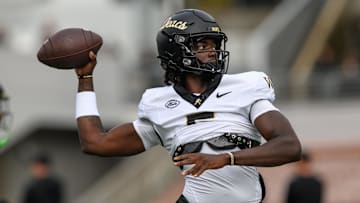 Oct 11, 2025; Corvallis, Oregon, USA; Wake Forest Demon Deacons quarterback Deshawn Purdie (5) throws a pass while warming hip before the game against the Oregon State Beavers at Reser Stadium.
