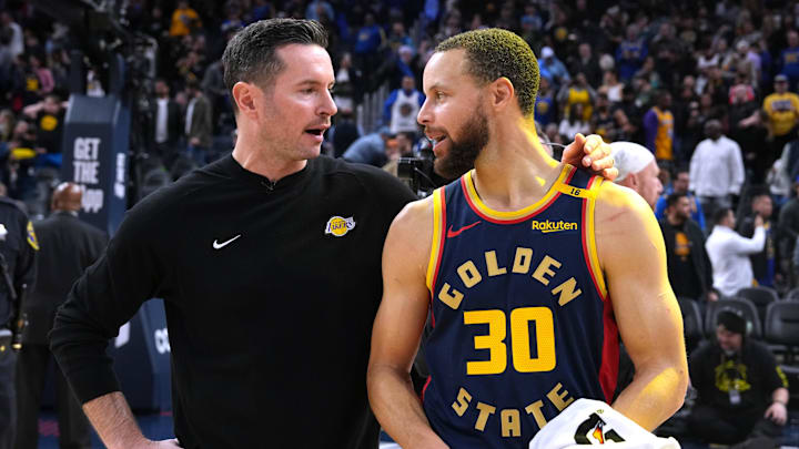 Los Angeles Lakers head coach Redick and Golden State Warriors guard Curry talk after the game at Chase Center. 