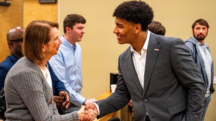 Ole Miss quarterback Trinidad Chambliss shakes hands with a supporter after the hearing of Chambliss in his lawsuit against the NCAA at Calhoun County Courthouse in Pittsboro, Miss., on Thursday, Feb. 12, 2026. Chambliss was granted a preliminary injunction against the NCAA.
